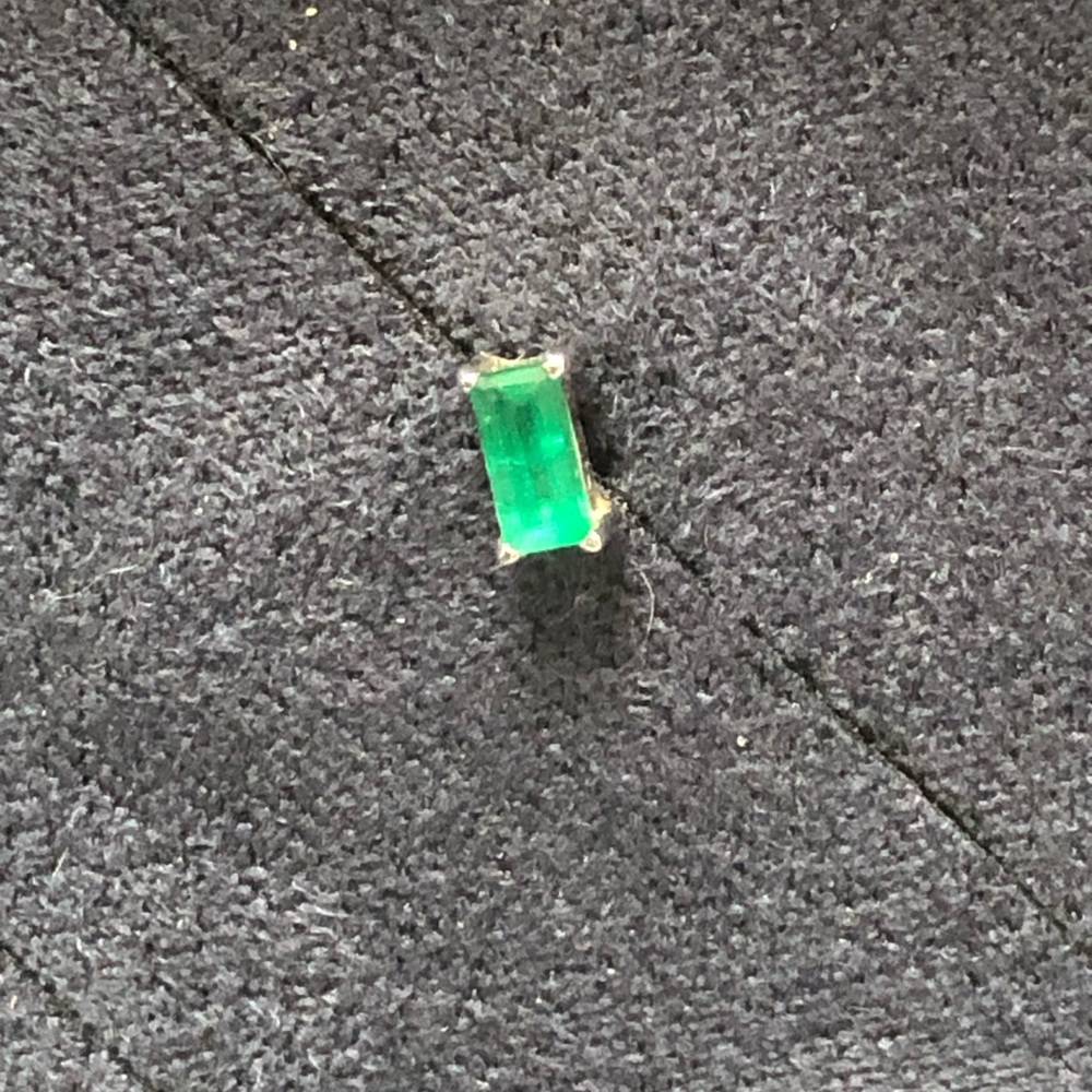 White gold Emerald baguette from BVLA. Threadless style.